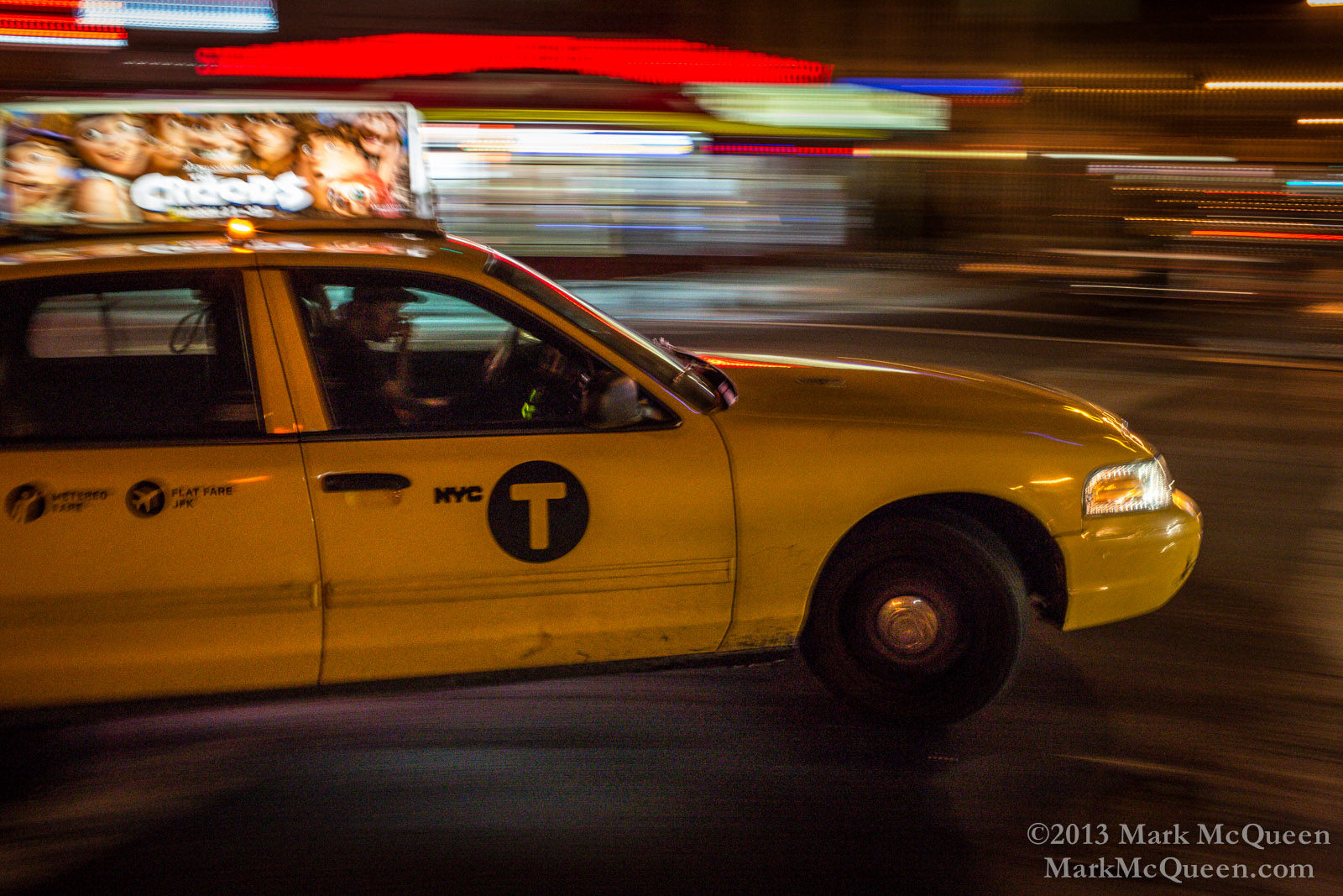 Taxi in motion: New York City Street Photography, nighttime in NYC